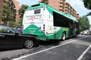 An ART bus suffered an apparent brake malfunction and rolled down a hill, damaging several vehicles