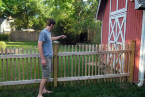 Jay Stapf points to shed where foxes were found